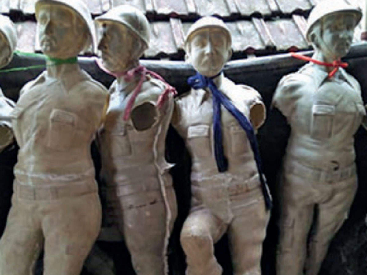 Models of soldiers being readied for the pandal near CR Avenue