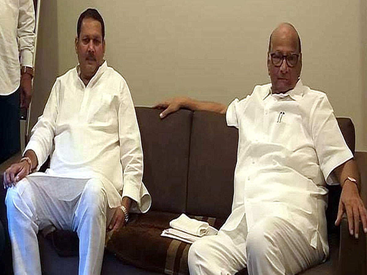 Udayanraje Bhosale (left) with NCP chief Sharad Pawar
