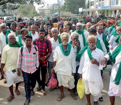 Farmers staged a protest at the City Railway Station on Friday, demanding immediate resolution of the Kalasa Banduri project.
