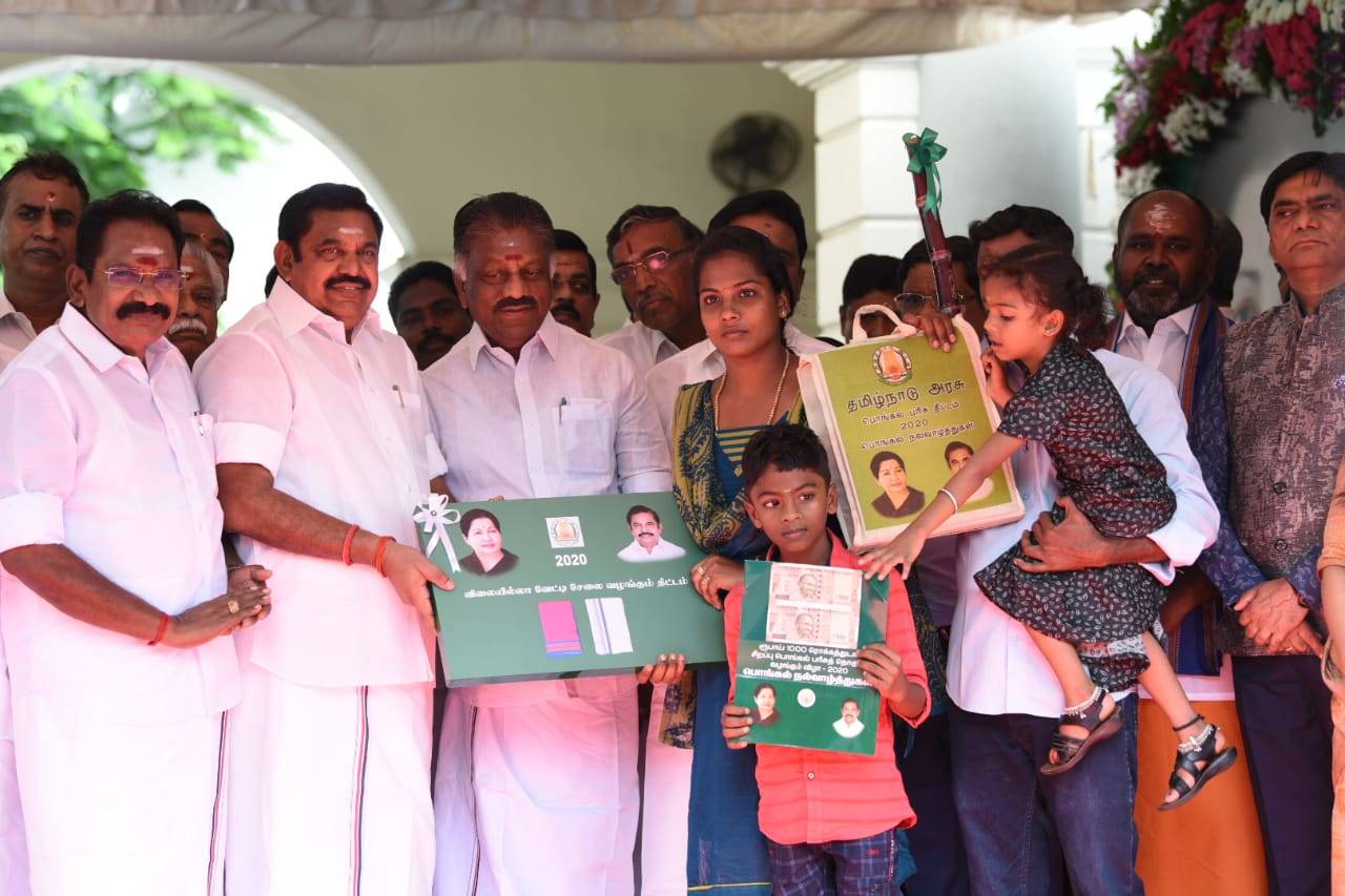 TN chief minister Edappadi K palaniswami distributing Pongal gift hampers, money and dhotis and saris to 16 families at an event in the Secretariat on Friday. (TOI photo by B A Raju) 
