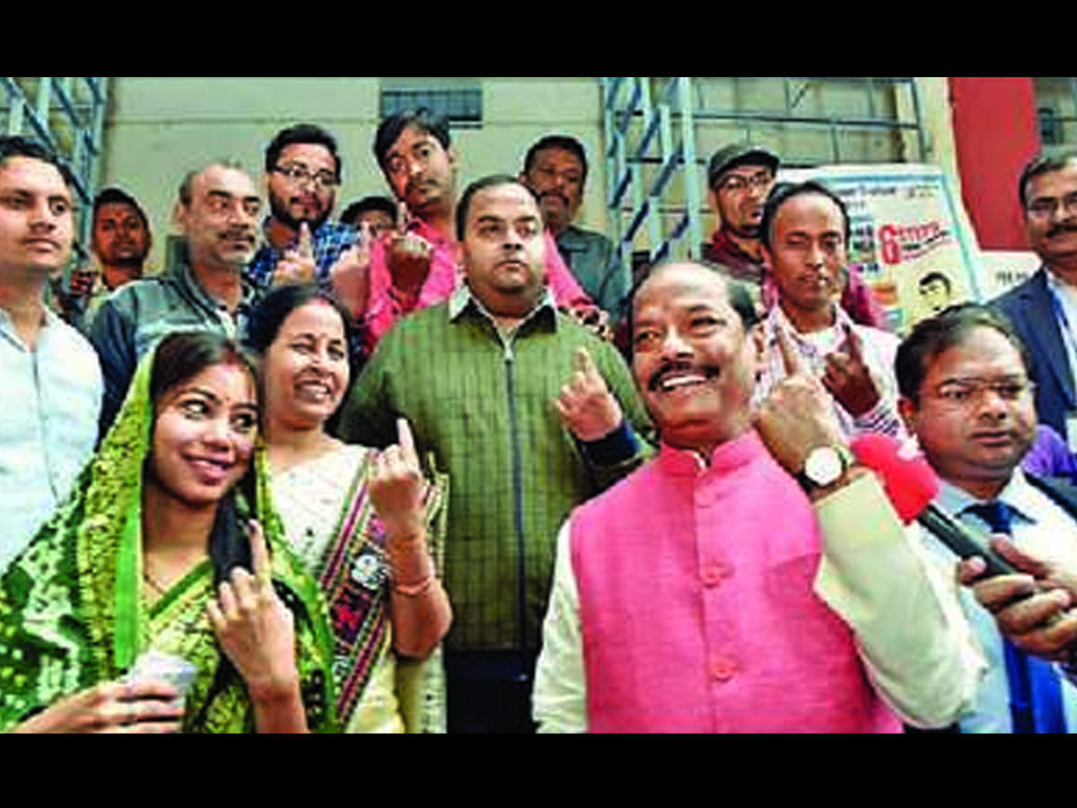 CM Raghubar Das with his family at a polling booth in Jharkhand.