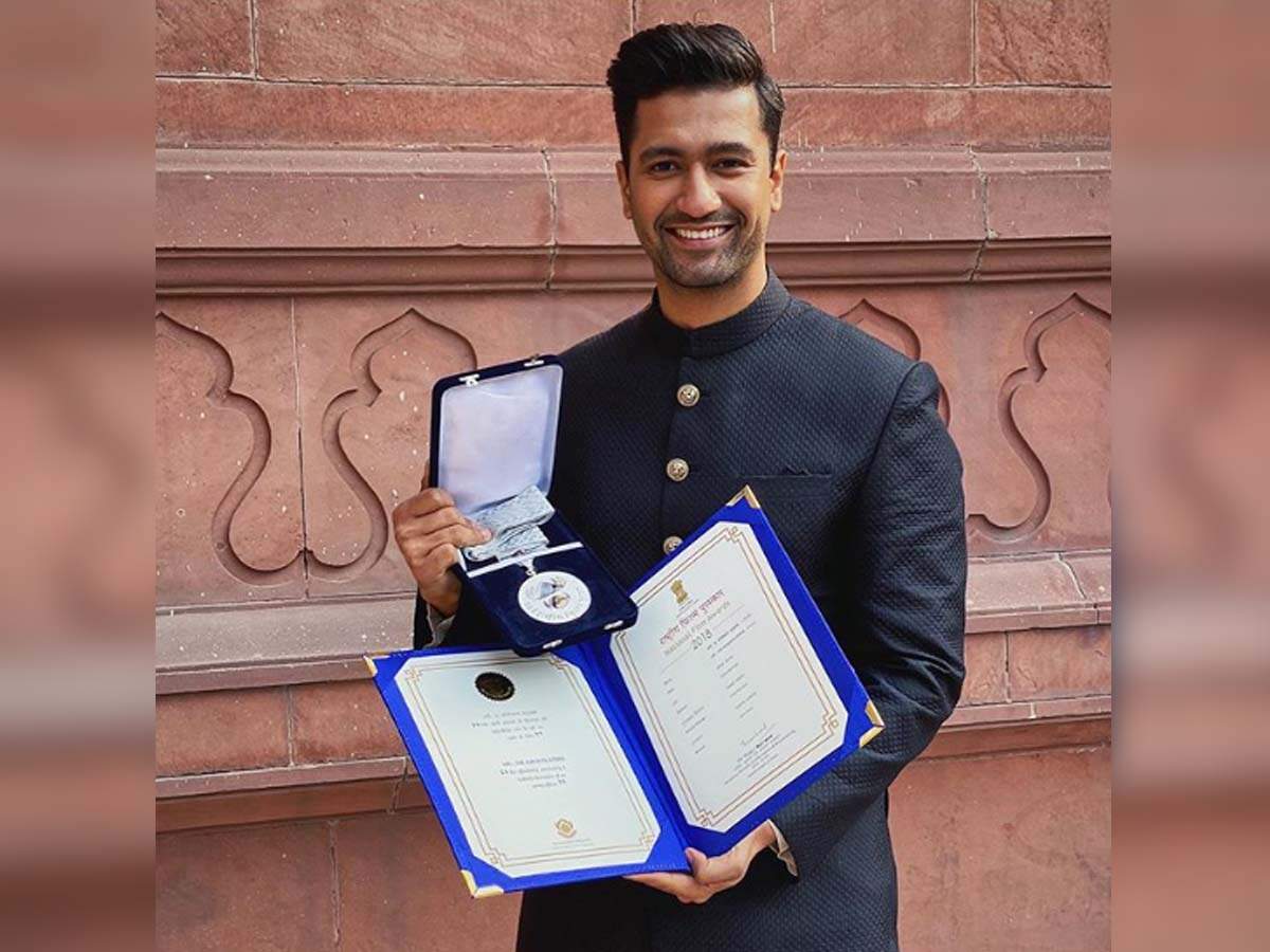 Vicky Kaushal shares a picture posing with his National Film Award; celebs pour in congratulatory messages | Hindi Movie News - Times of India