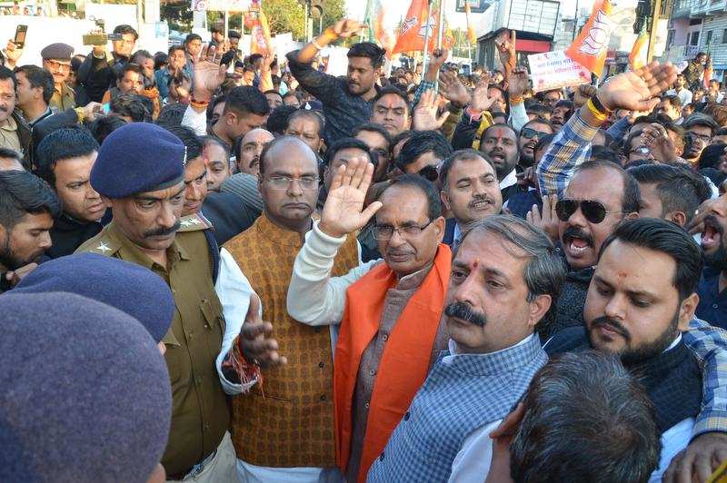 Ex-CM Shivraj Singh Chouhan with BJP workers at the collectorate on Friday