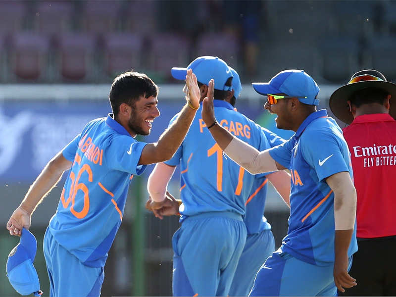 Akash Singh celebrates taking the final wicket during the quarter-final against Australia. (Getty Images)