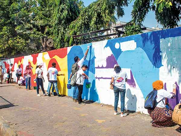 Over 200 Mumbaikars paint station wall in support of mental health