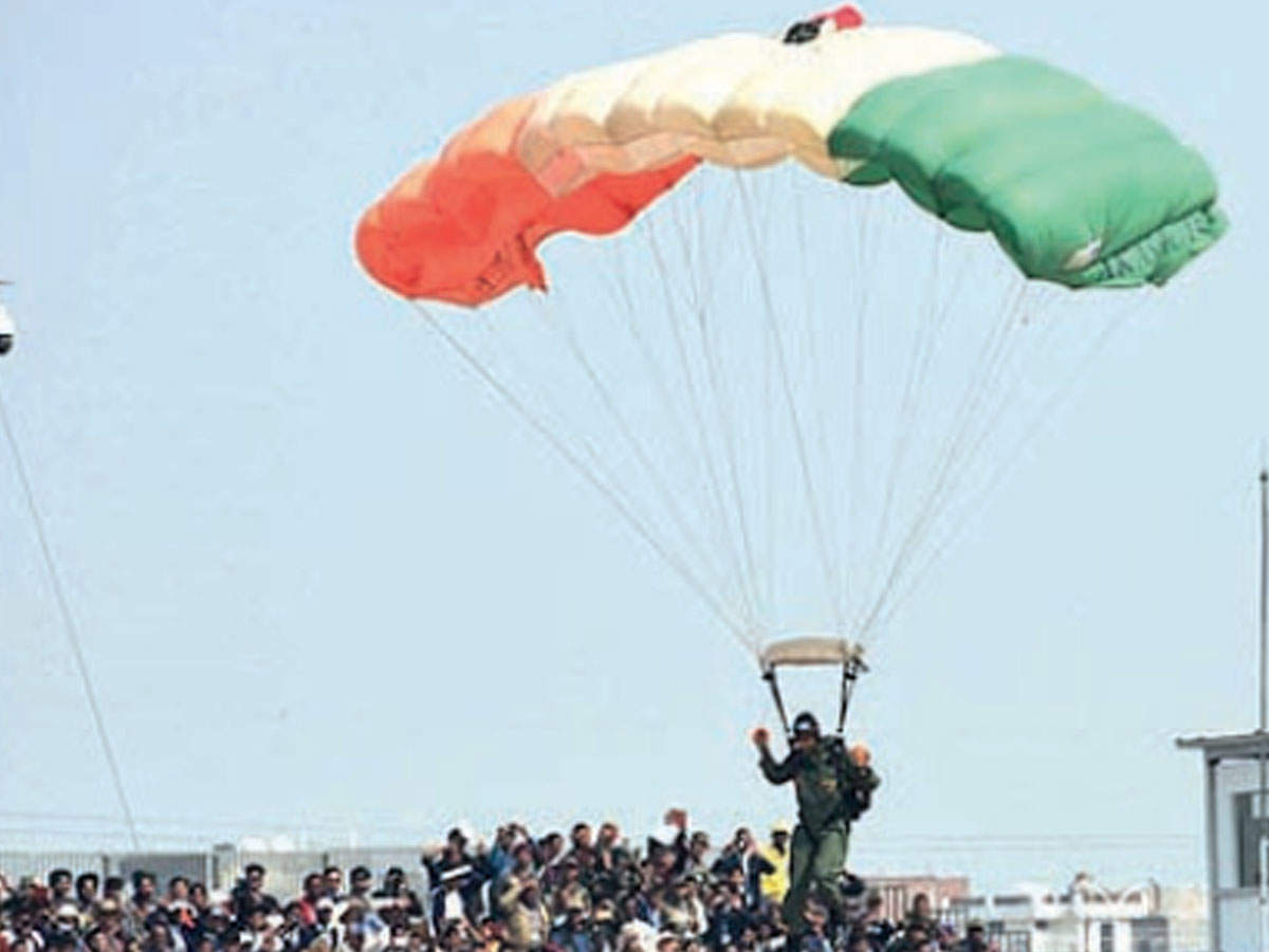 Paratroopers display their skills at the DefExpo2020 on Thursday