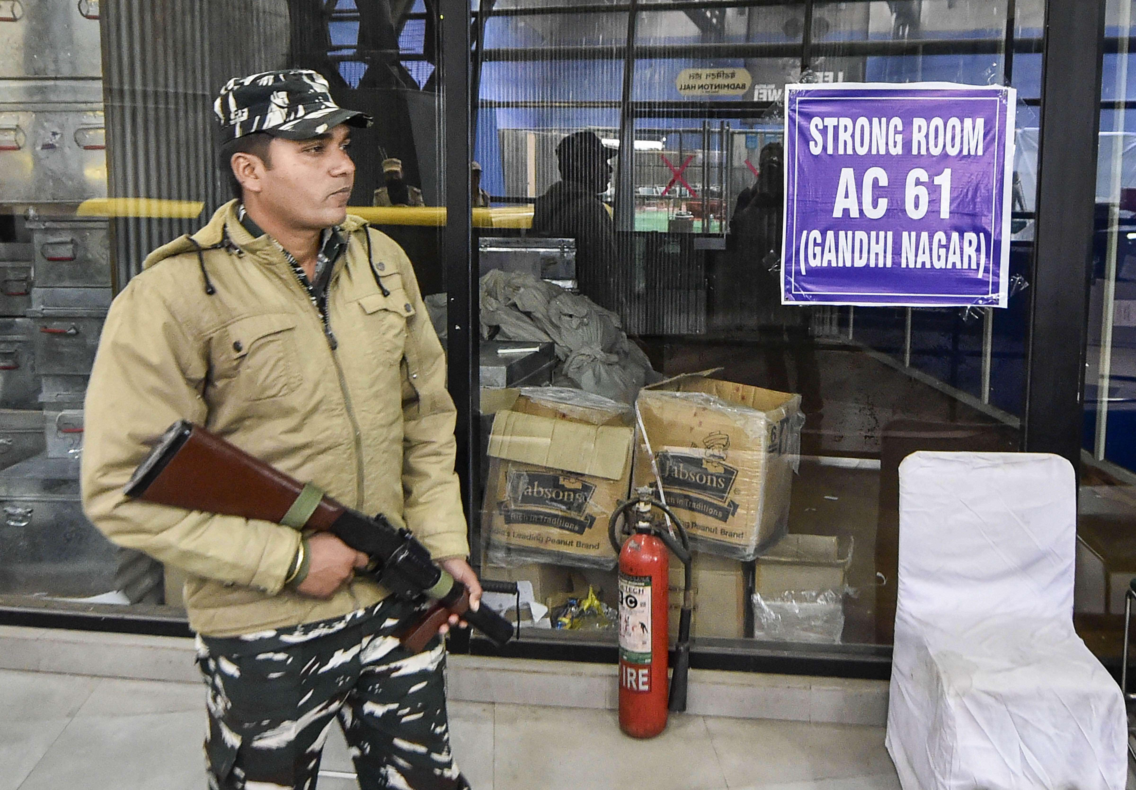 A security personnel stands guard outside a strong room (PTI)