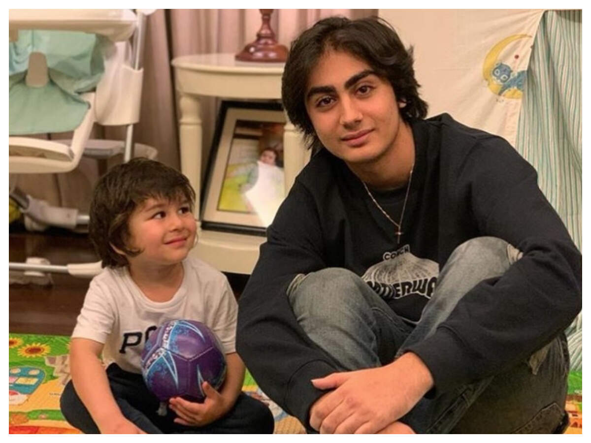 Taimur poses with Malaika's son Arhaan Khan