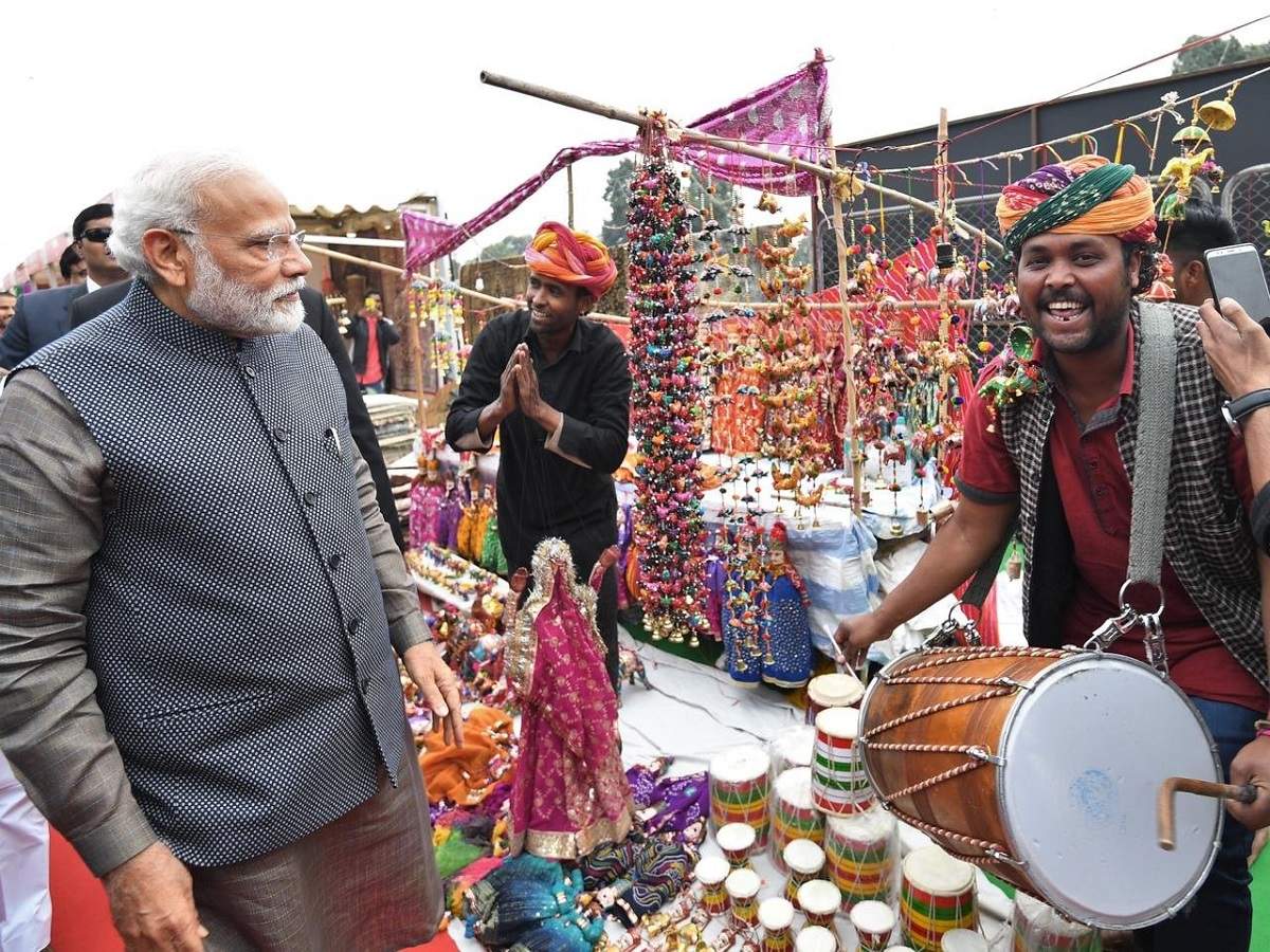 PM Modi makes surprise visit to 'Hunar Haat' at Rajpath; relishes  'litti-chokha' | India News - Times of India