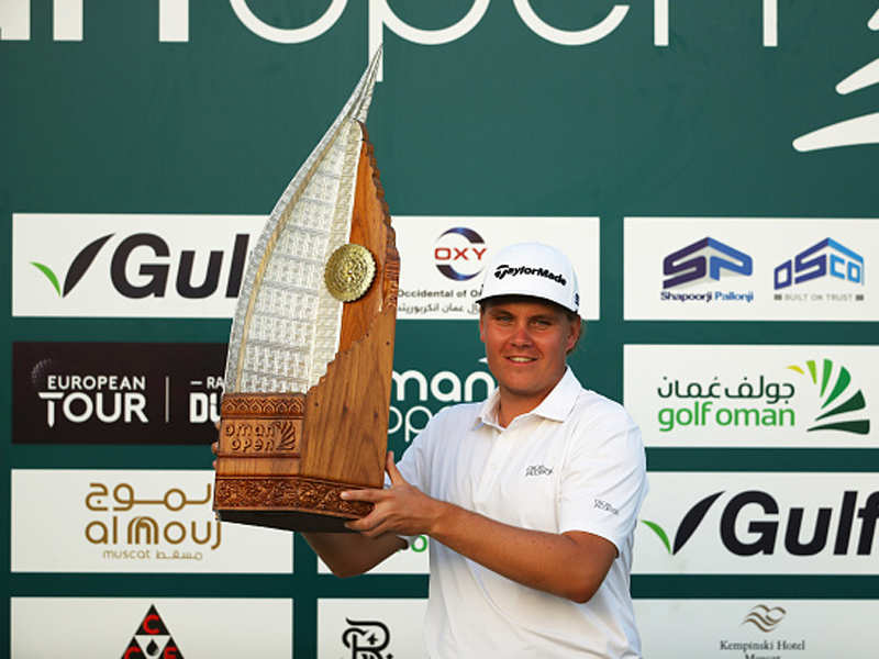 Sami Valimaki poses with the trophy after winning the Oman Open. (Getty Images)