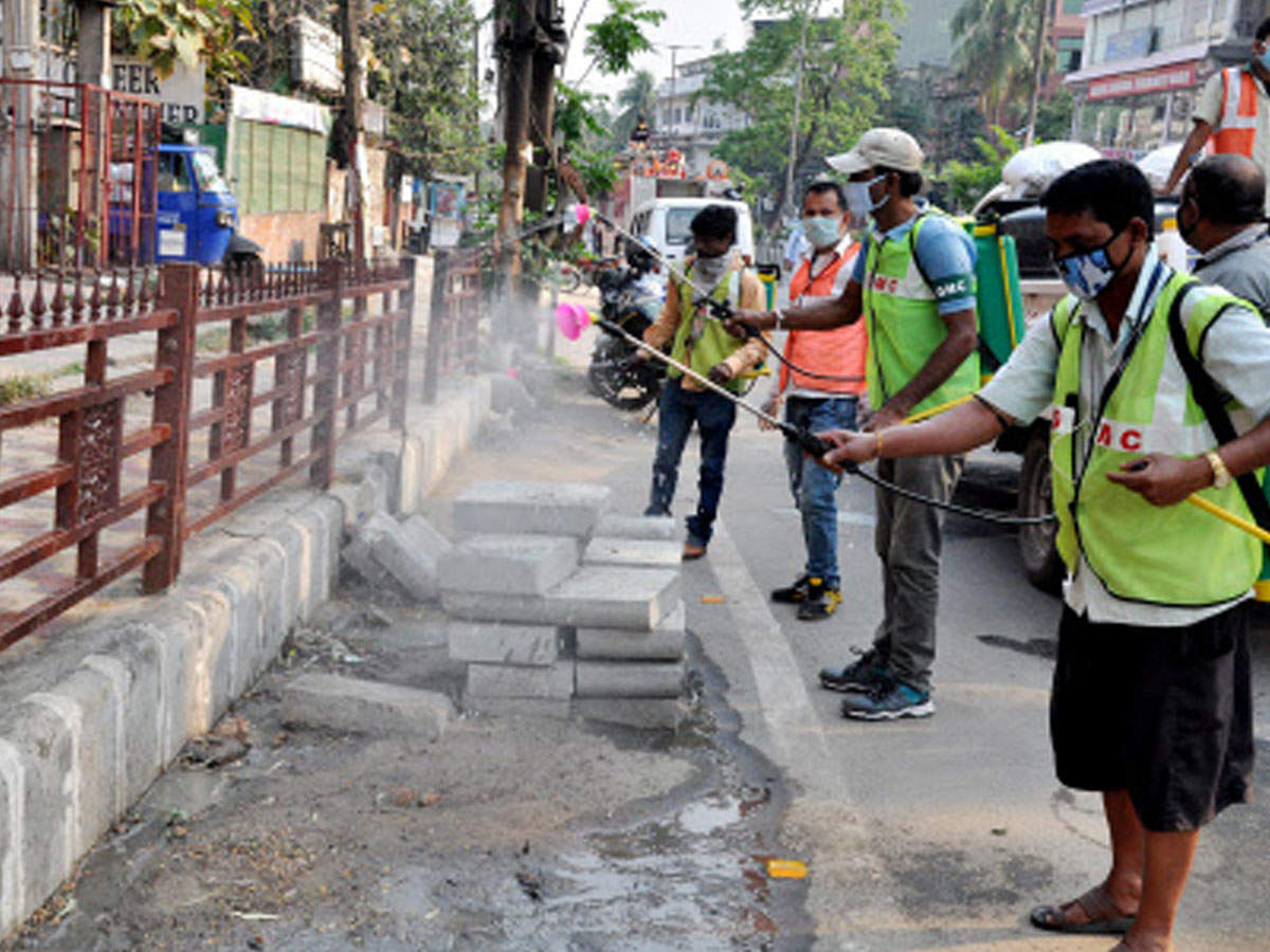 Guwahati Municipal Corporation workers spray disinfectants during the nation-wide lockdown in the wake of the coronavirus in Guwahati on Tuesday (ANI Photo)