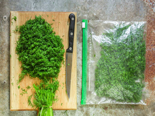 Cut herb ends and place the herbs in a resealable bag in the fridge