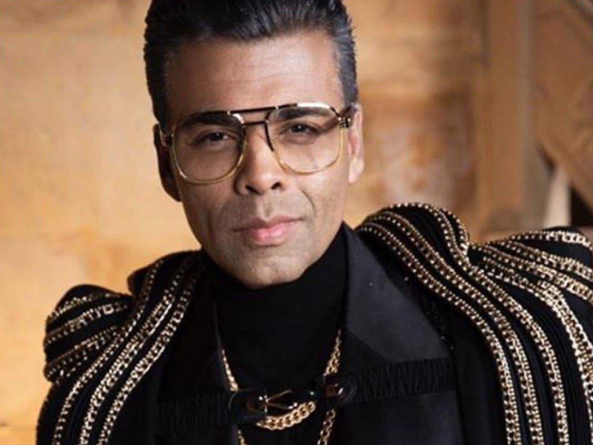 Karan Johar shows off his new salt and pepper look in a cool ...