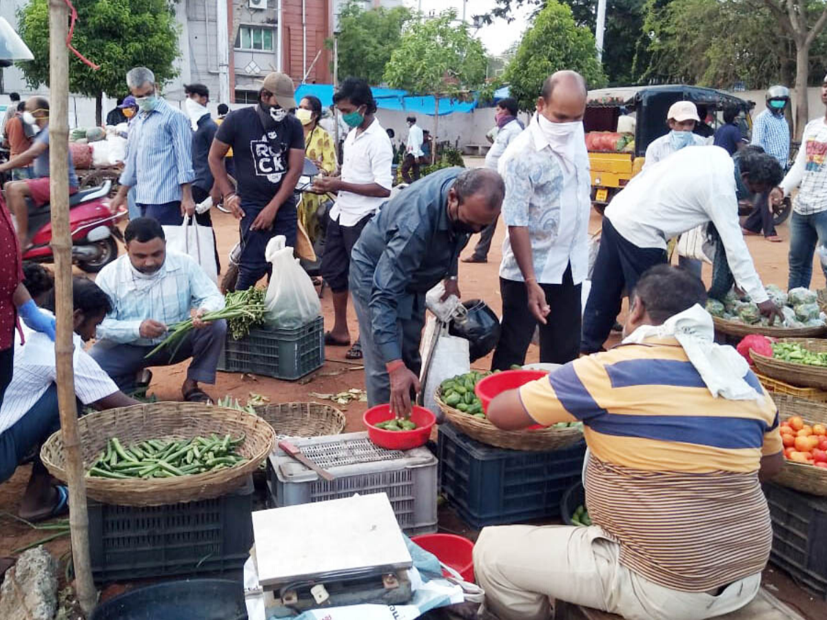 People gather at a vegetable market amid the Covid-19 lockdown in Bhubaneswar on Saturday. (ANI Photo)