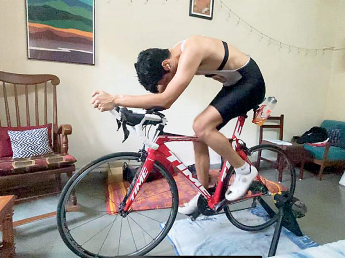 One of the organizers, Abhishek Bhagwat, cycles at his residence 