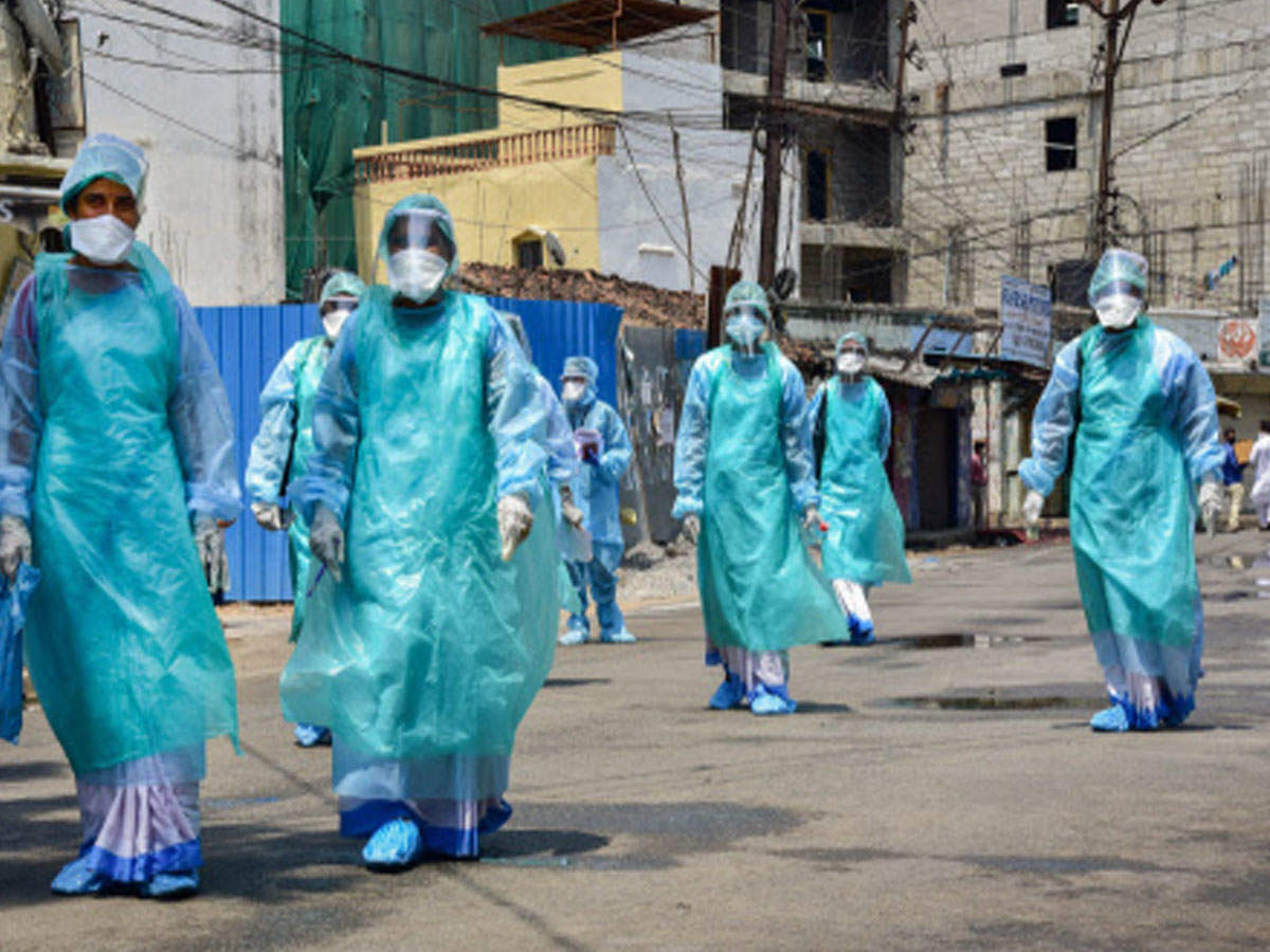 Health workers wearing protective suits prepare to disinfect a locality in Hyderabad. (Photo: PTI)