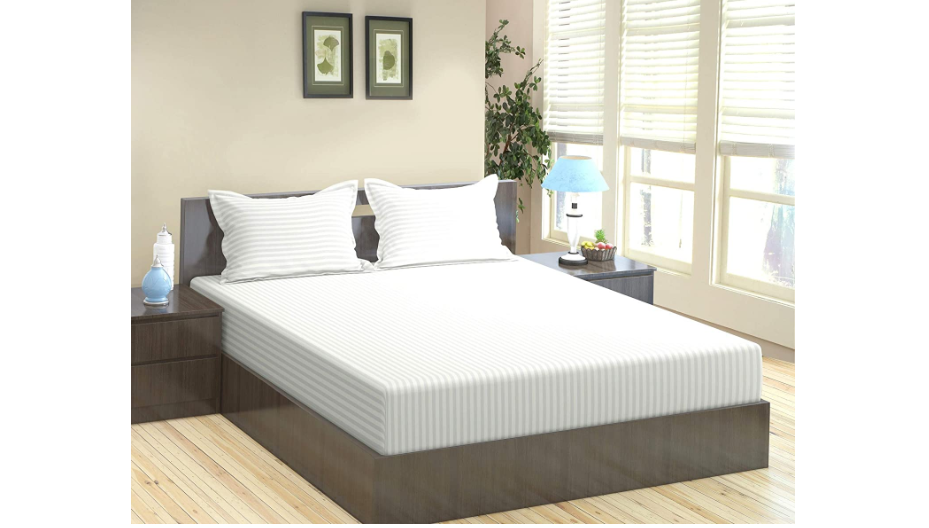 white bedsheet with pillow cover