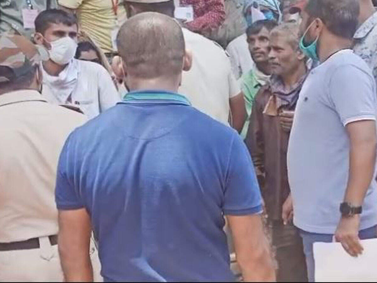 maharashtra palghar tehsildar abuses kicks migrant revenue minister orders probe mumbai news times of india maharashtra palghar tehsildar abuses kicks migrant revenue minister orders probe