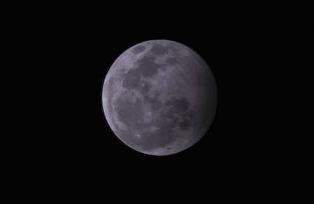 A file photo of Penumbral Lunar Eclipse as seen in Allahabad, India