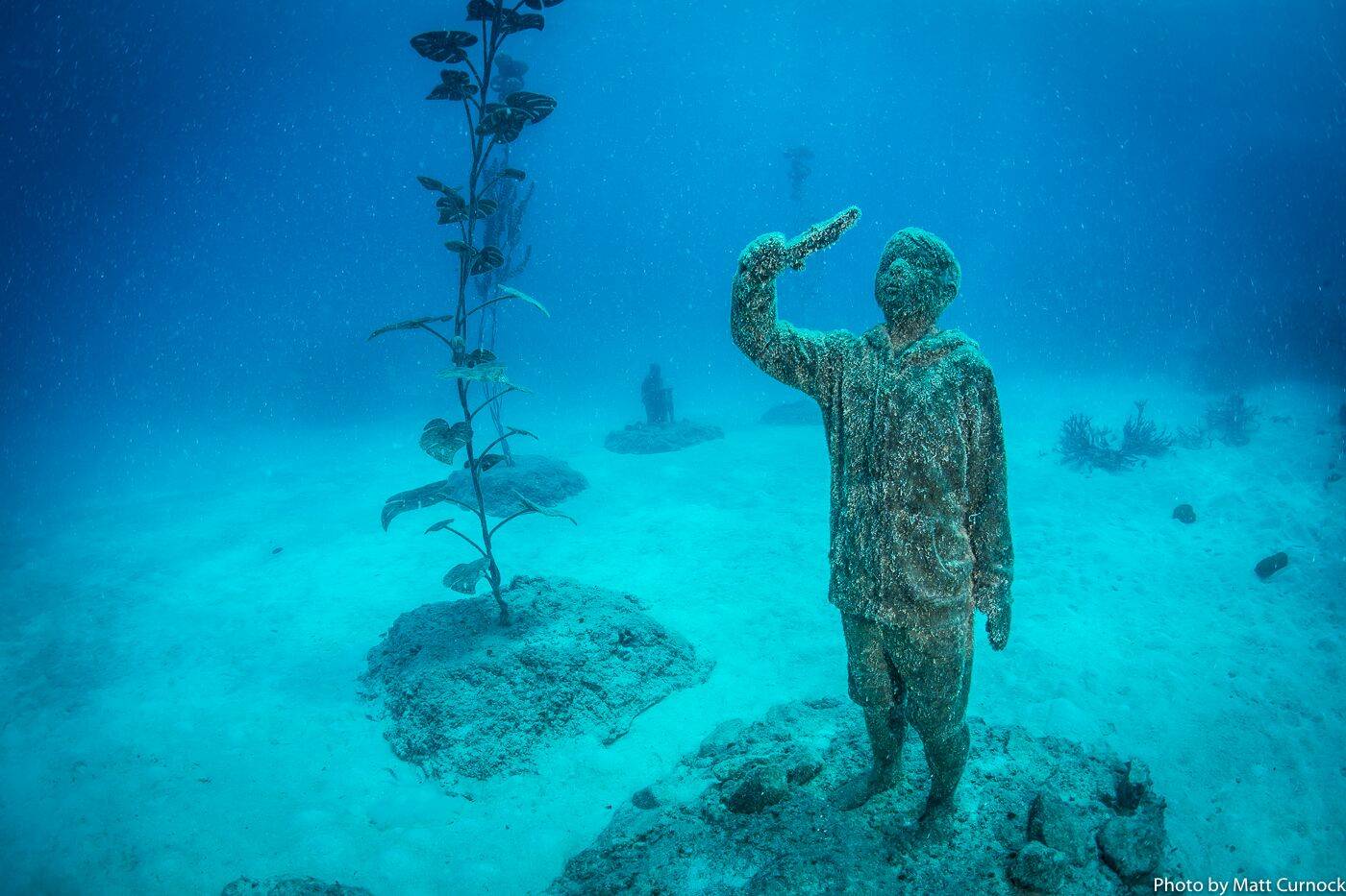 An underwater art museum graces the Great Barrier Reef