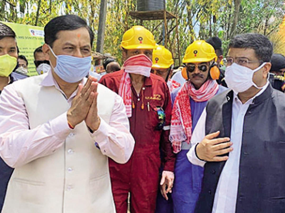 Assam chief minister Sarbananda Sonowal and Union petroleum minister Dharmendra Pradhan at the Baghjan oil well fire site