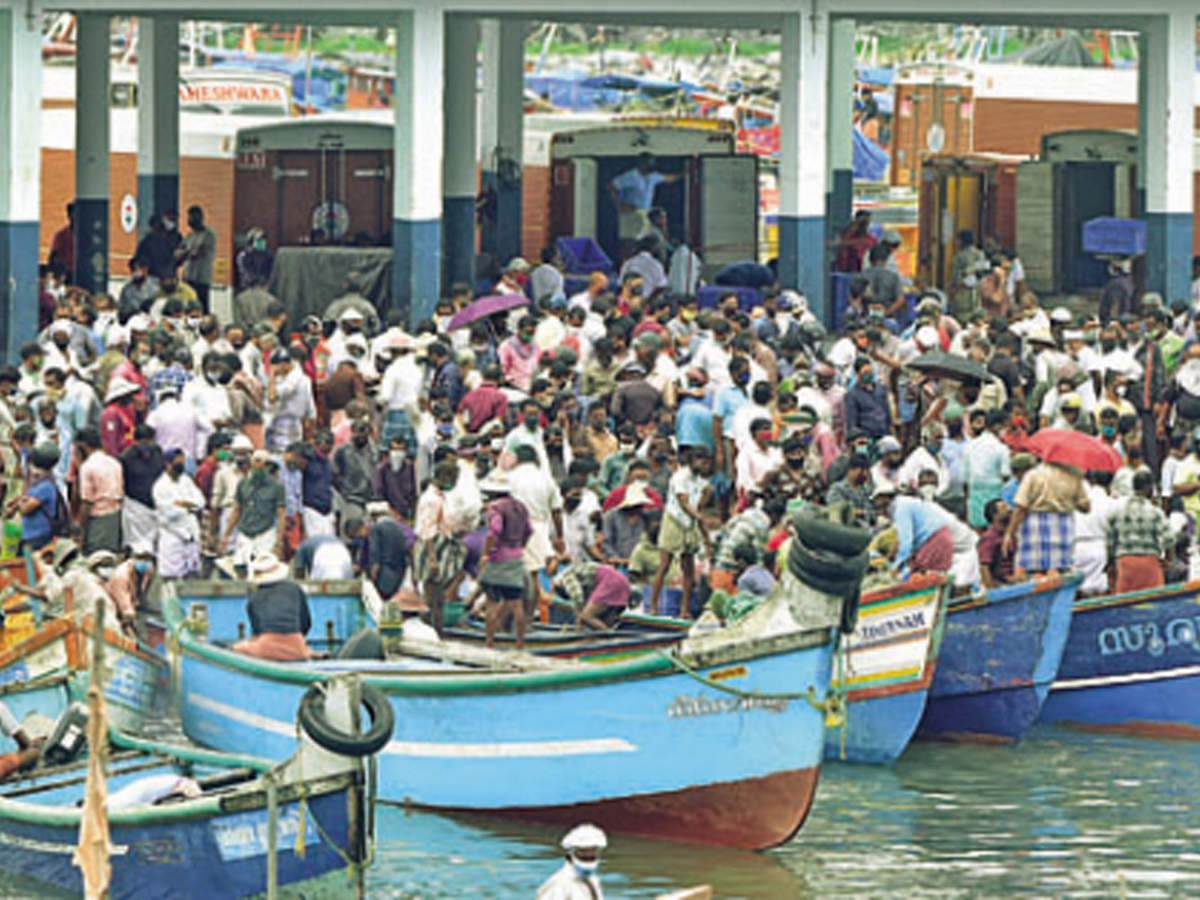 Social distancing went for a toss at Koyilandy harbour on Thursday as buyers and fishermen thronged the area
