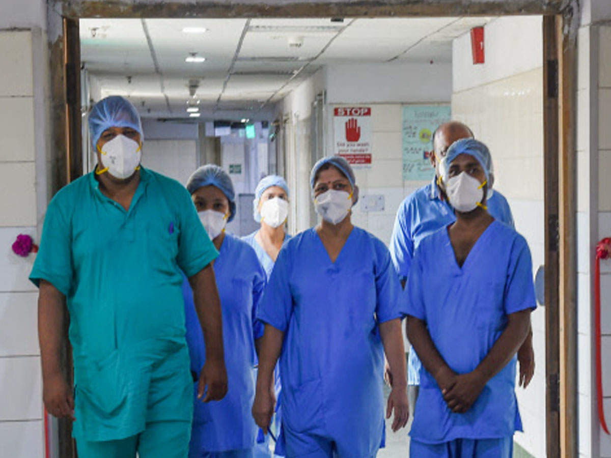 Medics outside the Covid-19 isolation ward of the Rajiv Gandhi Super Specialty Hospital in New Delhi
