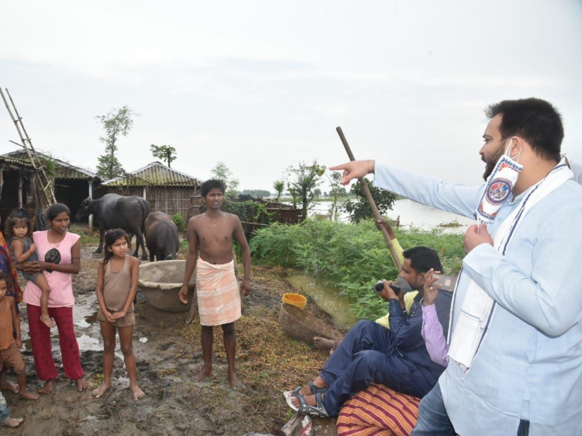 RJD leader Tejashwi Yadav during his vistit to flood-affected areas in the state.