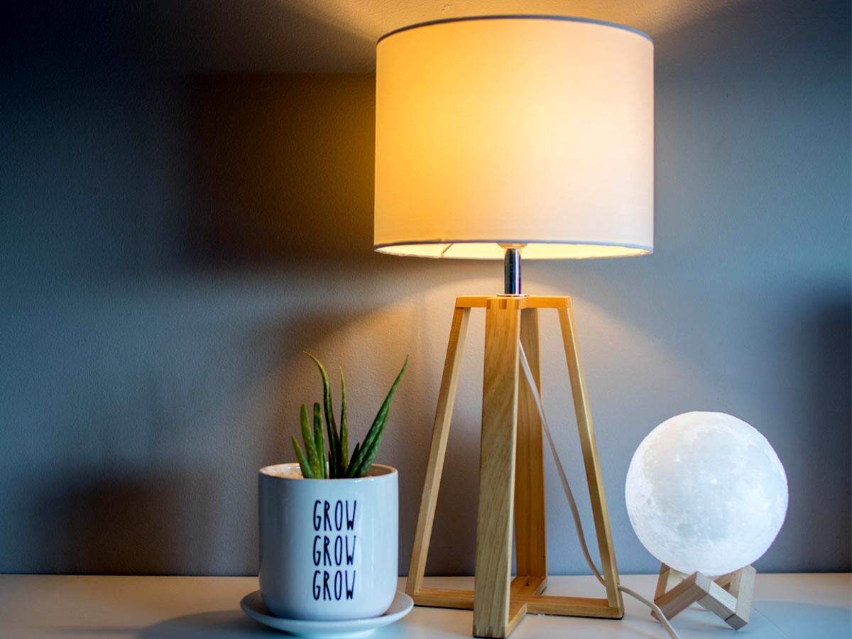 studying under table lamp