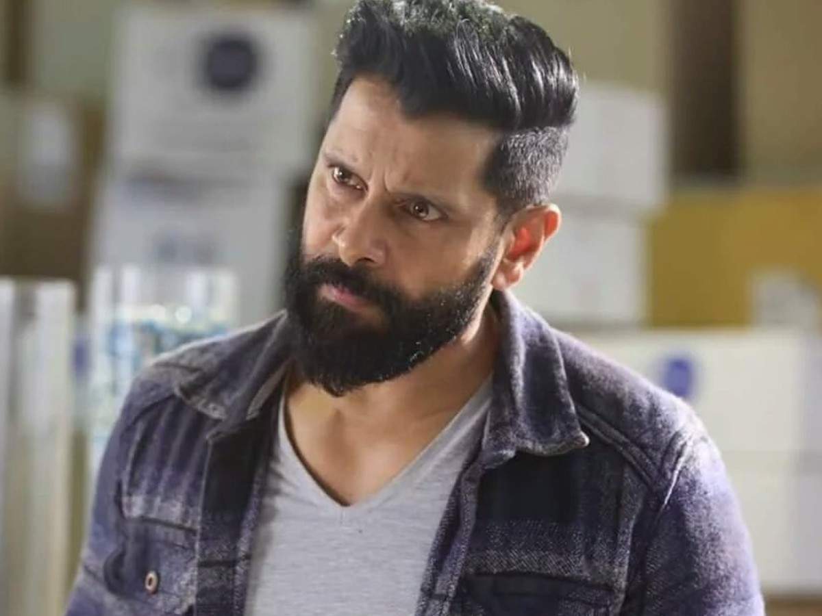 Chiyaan Vikram Latest Photo Shoot Stills  Mens hairstyles thick hair Long  thick hair men Hair tint