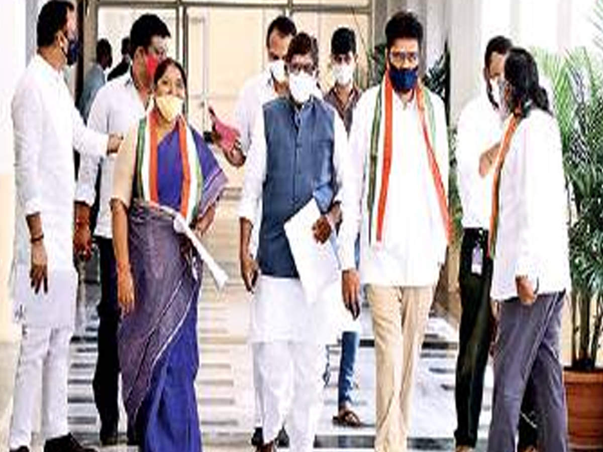 Congress leaders walk towards the assembly hall to attend the monsoon session on Monday