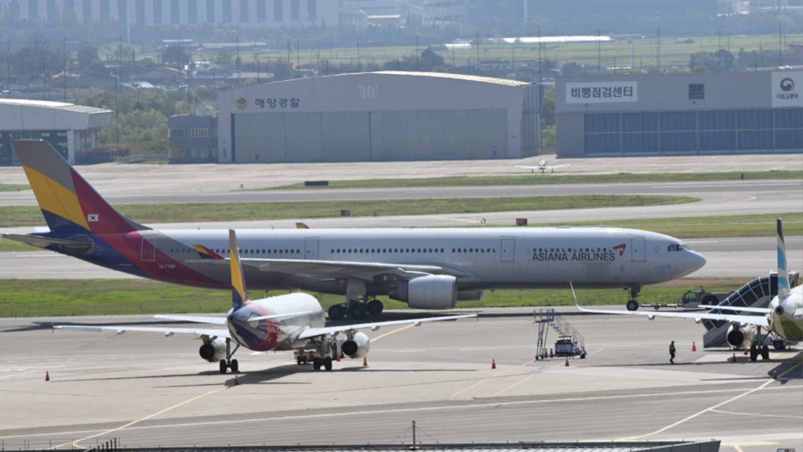 asiana airlines carry on size