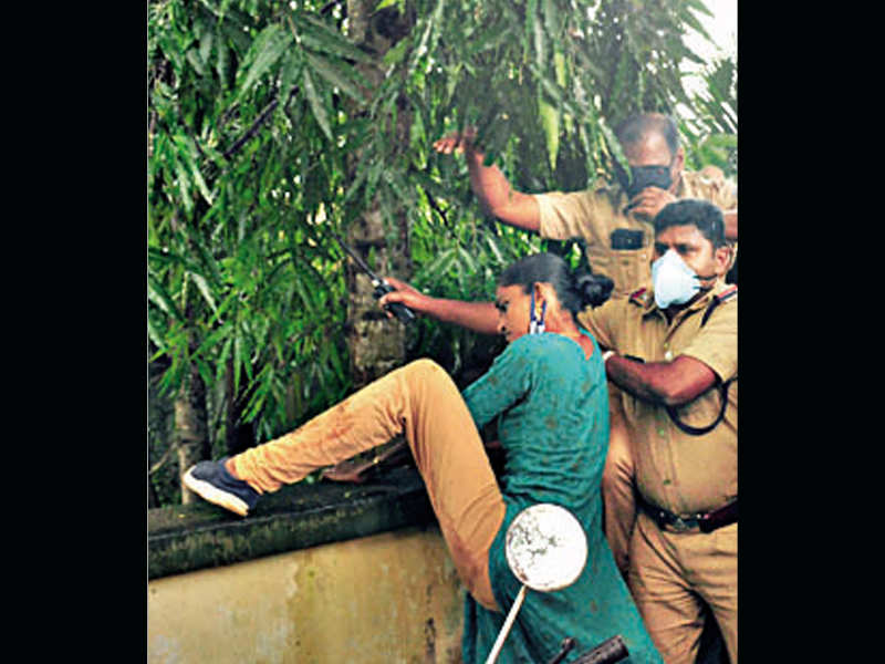 A Congress worker trying to scale the wall of Jaleel's residence