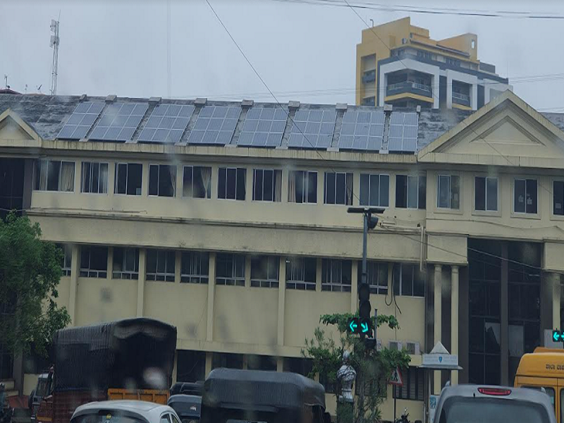 GREEN ENERGY: Work of installing 123.60-kW solar panels is going on at Mangaluru City Corporation's main office at Lalbagh.