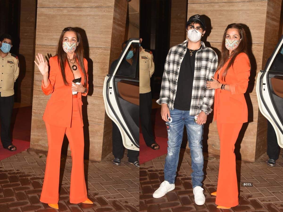 Photos: Malaika Arora looks stunning in an orange pantsuit as she leaves for her birthday celebration with son Arhaan