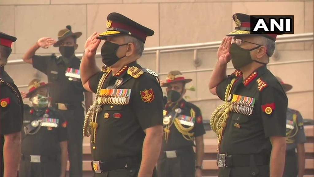 Chief of Defence Staff (CDS) General Bipin Rawat, Army chief General Manoj Mukund Naravane pay tribute at National War Memorial on Infantry Day. (ANI)