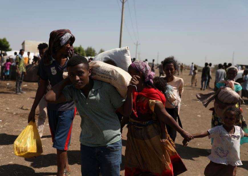 Refugees from the Tigray region of Ethiopia arrive at Hamdayet, Sudan (AP)