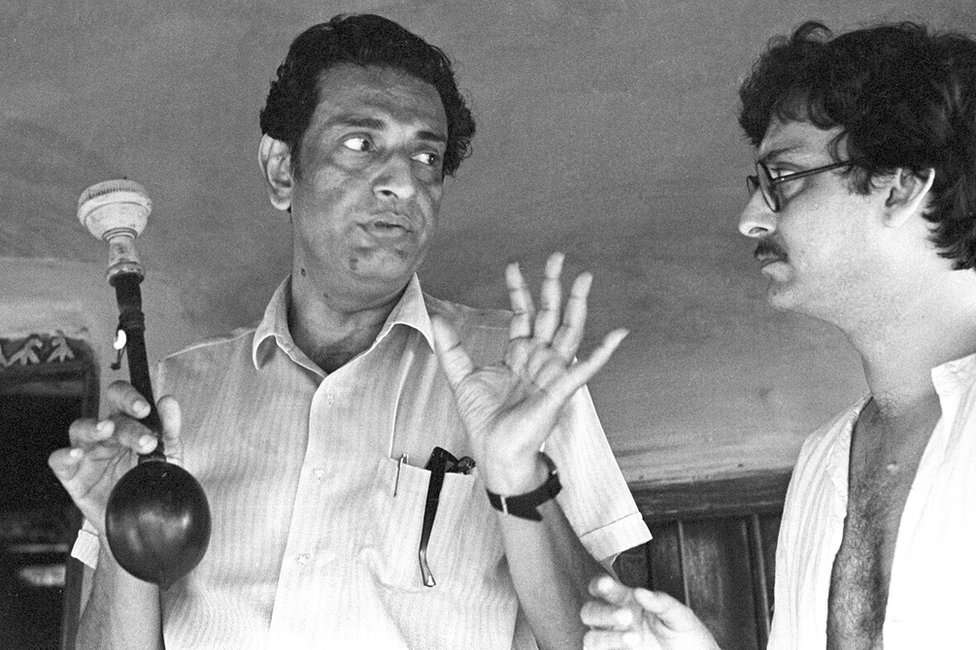 Soumitra Chattopadhyay and Satyajit Ray in shot discussion. Pic Courtesy: Twitter