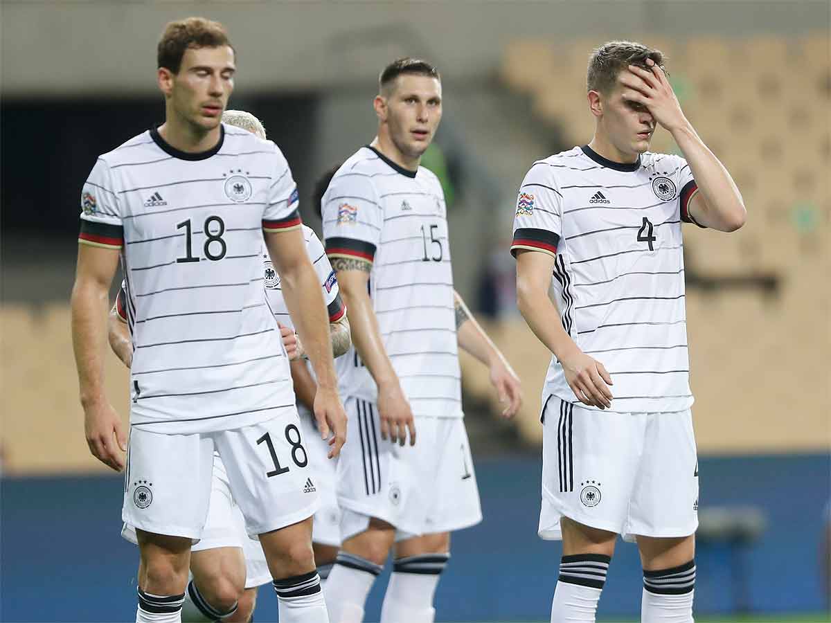 Germany's Leon Goretzka, Niklas Suele and Matthias Ginter after the match against Spain in Seville. (AP Photo)