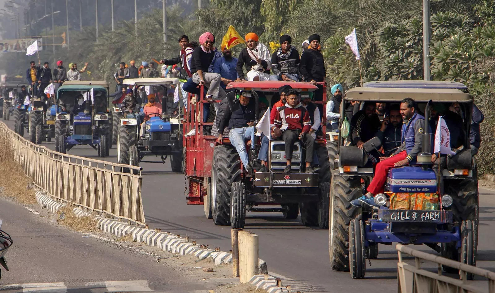 Farmers and their supporters take part in a tractor rally during a protest to support the nationwide strike, called by farmer unions to press for repeal of the Centre's Agri laws, in Amritsar.