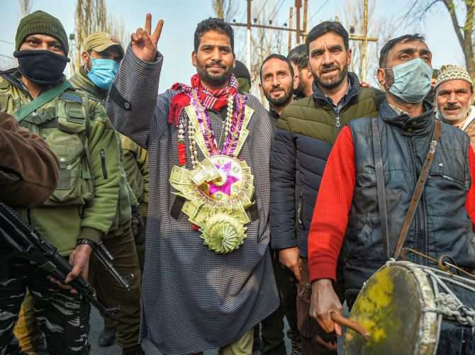 <p>BJP candidate Aijaz Hussain flashes victory sign after his lead in the District Development Council election results in Srinagar. <span class="credit">(PTI)</span></p><p><span class="credit"><br></span></p>