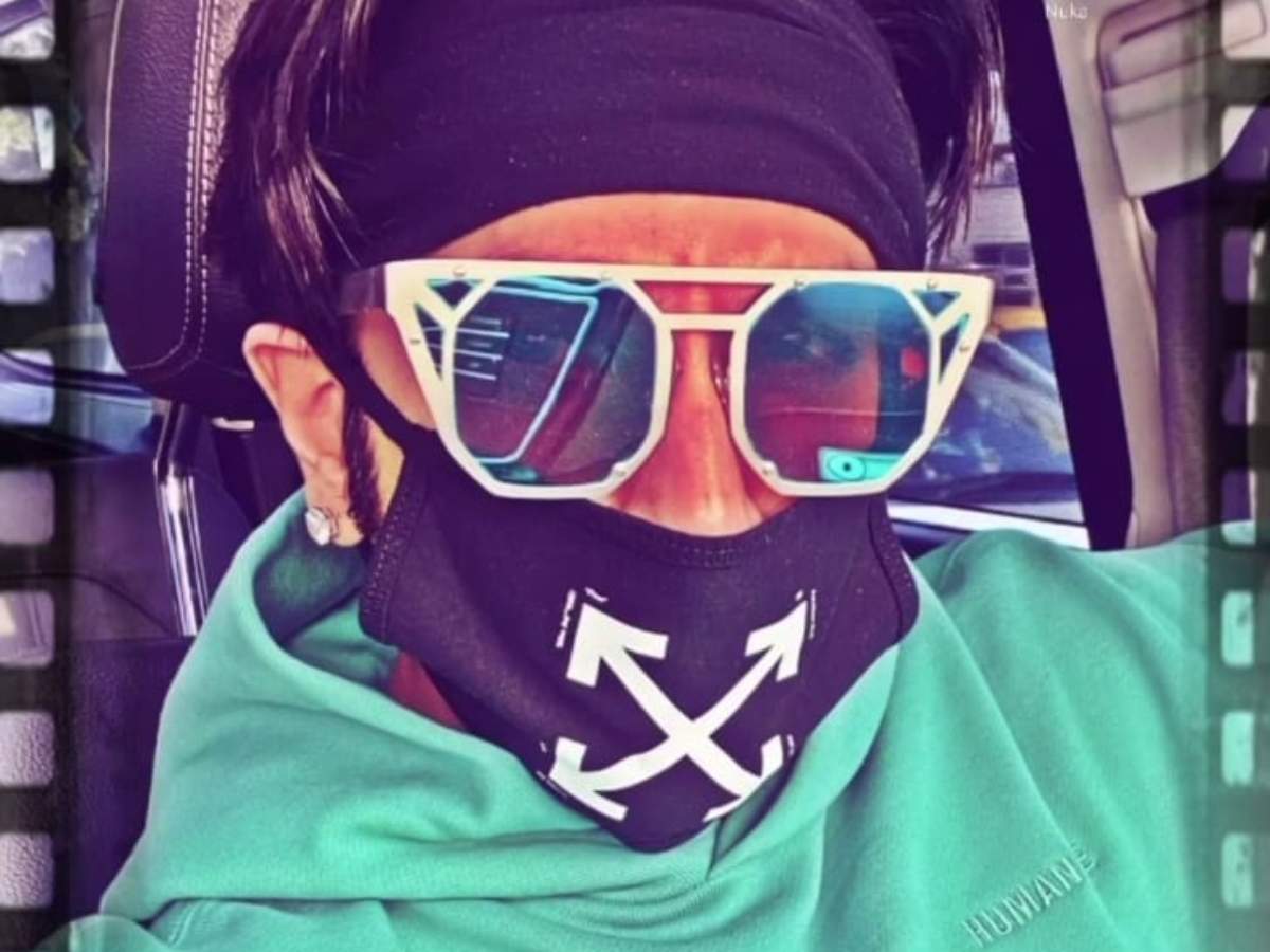 Arjun Kapoor with sunglasses on wearing Powder Blue Hooded