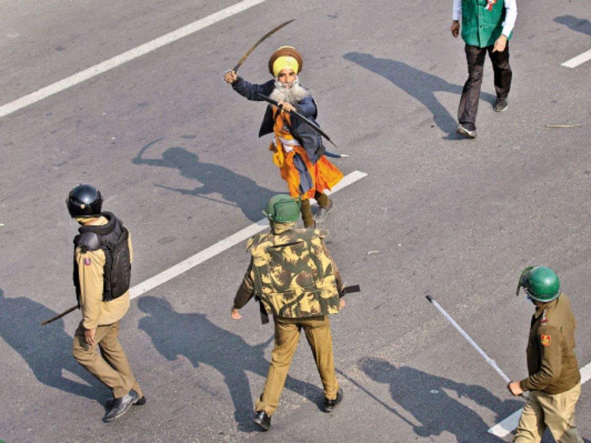The man in the viral picture face to face with a Nihang Sikh brandishing a sword, was deployed near Akshardham when a mob charged at him