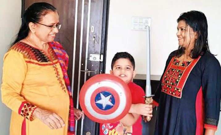 Infectious disease consultant Dr Kirti Sabnis (in black) had to get her son a toy ‘shield’ to compensate for the jab she received