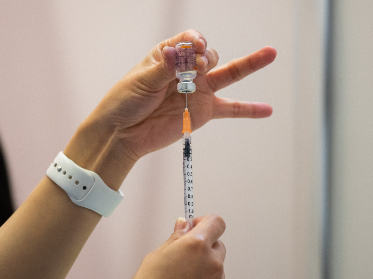 A nurse fills a syringe with a dose of the Sinovac Biotech Ltd. Covid-19 vaccine at a community vaccination center in Hong Kong. Photo: Getty Images