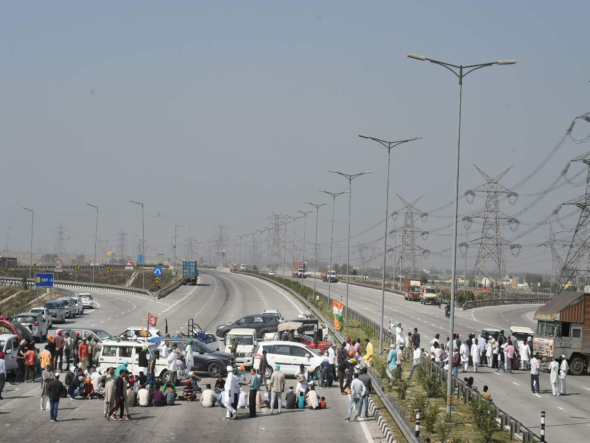 Farmers block the KMP Expressway near Duhai to mark the 100th day of their ongoing agitation (Credit:PTI)