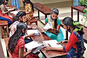 Class X students of St Mary’s Convent Girls High School engaged in the last minute preparations for the exam, in Kochi on Wednesday