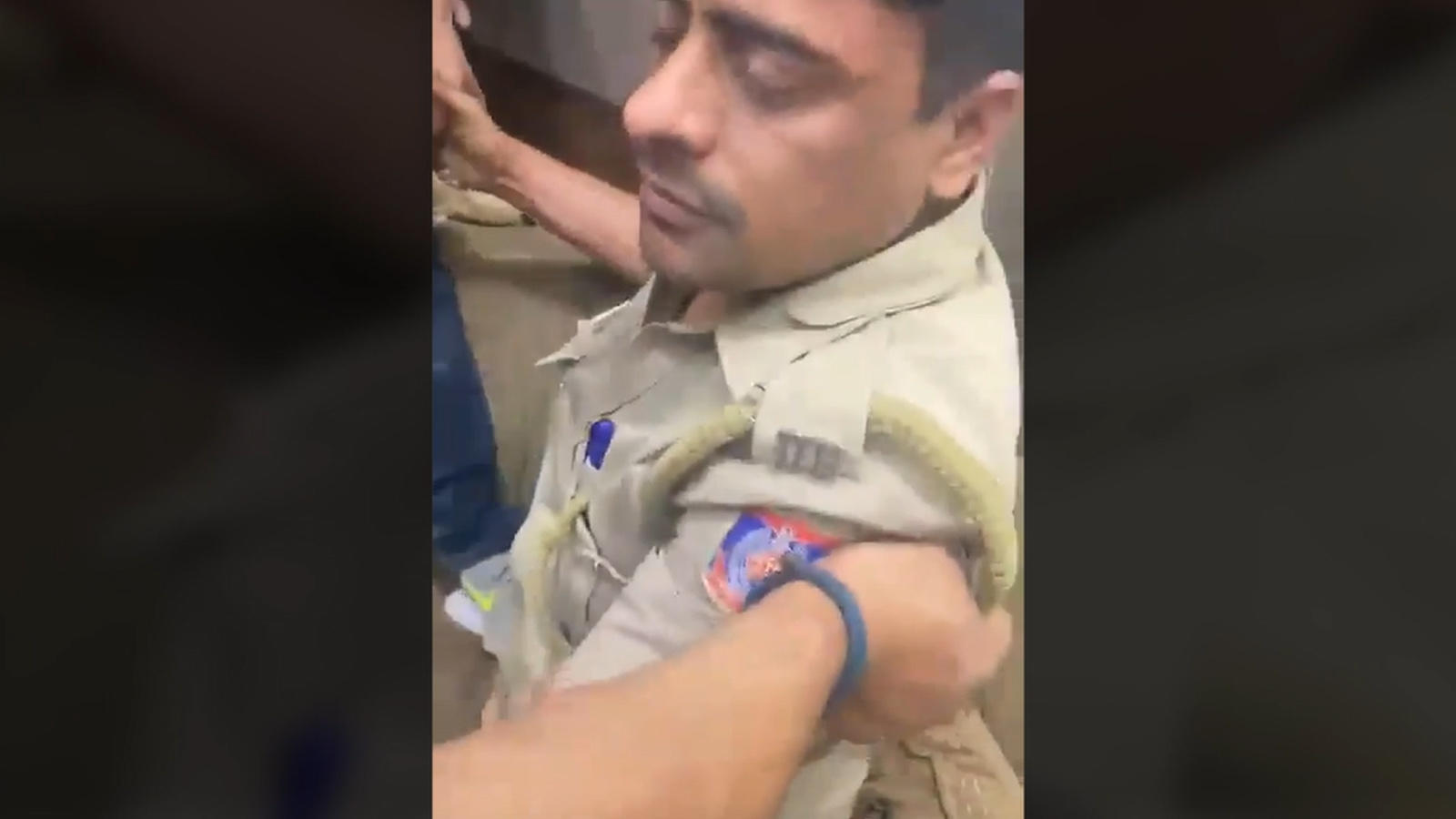 A Delhi Police personnel was seen allegedly beaten up, on duty, by a gym owner in Delhi’s Dwarka area. The video went viral. 