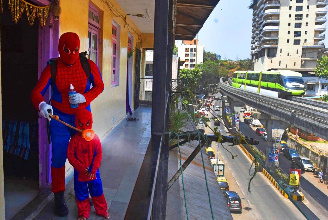 Covid 19 Man Dressed As Spiderman Sanitizes Chawl In Mumbai City Times Of India Videos
