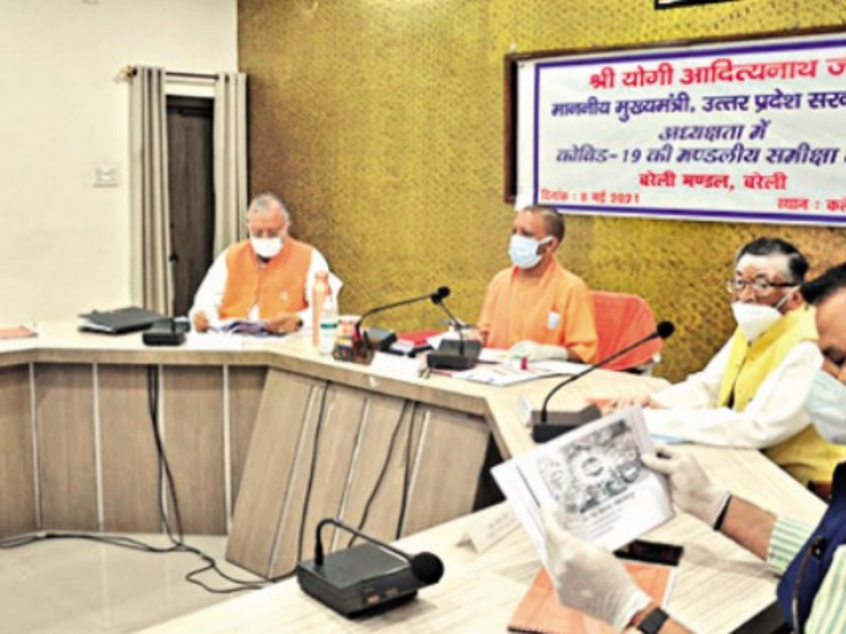 Yogi Adityanath addressing officials and media persons in Bareilly